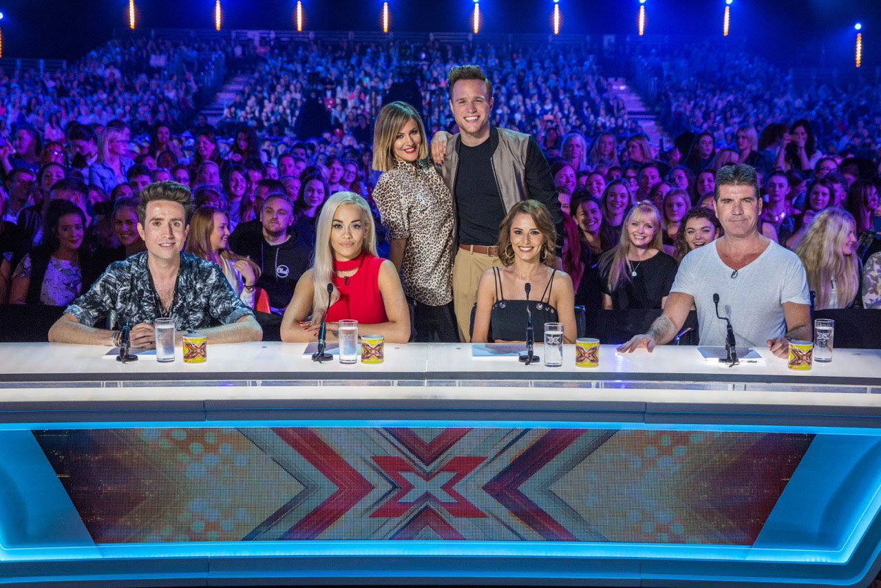 FIRST LOOK AT NEW X FACTOR 2015 JUDGES TOGETHER AS AUDITIONS BEGIN. PICTURE SHOWS: NICK GRIMSHAW, RITA ORA, CAROLINE FLACK, OLLY MURS, CHERYL FERNANDEZ-VERSINI AND SIMON COWELL.