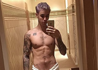 Justin Bieber Reveals His Blue Rinse In Racey Towel Only Shots
