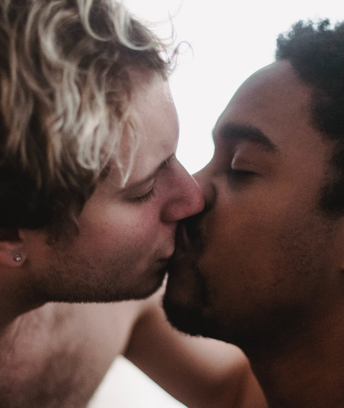 two men kissing