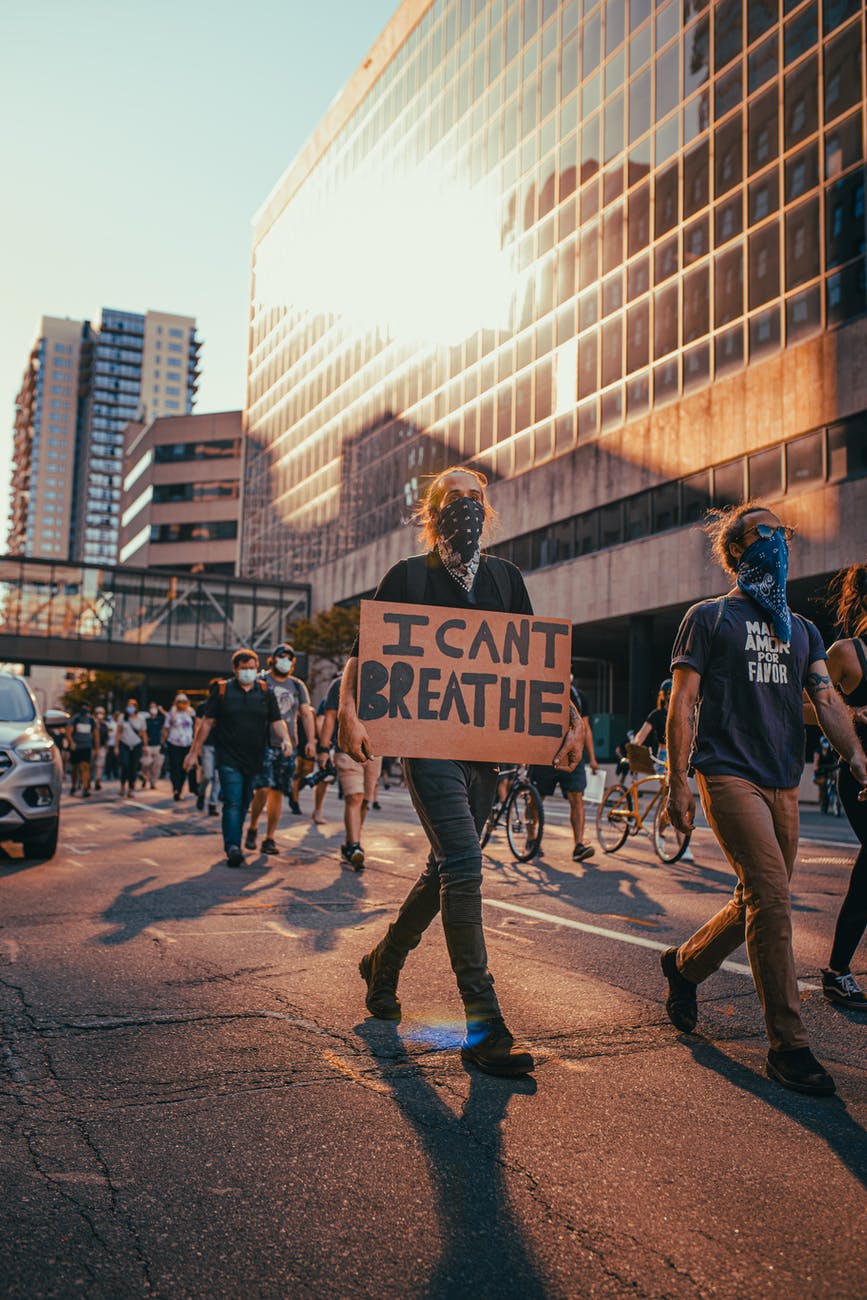 people protesting on a street